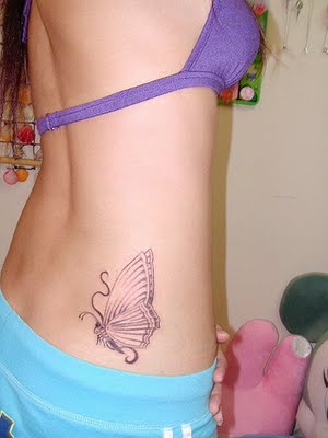 lower back butterfly tattoo. sexy utterfly tattoo design