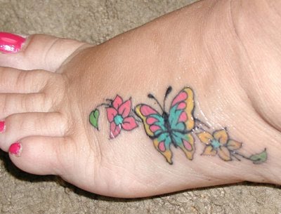 butterfly tattoos on feet. utterfly tattoo design of