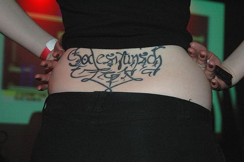 This rather hot scroll lower back tattoo designs is made up of scroll that