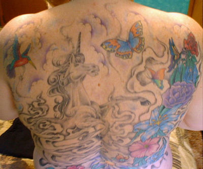 full back tattoo woman. The full back piece tattoo